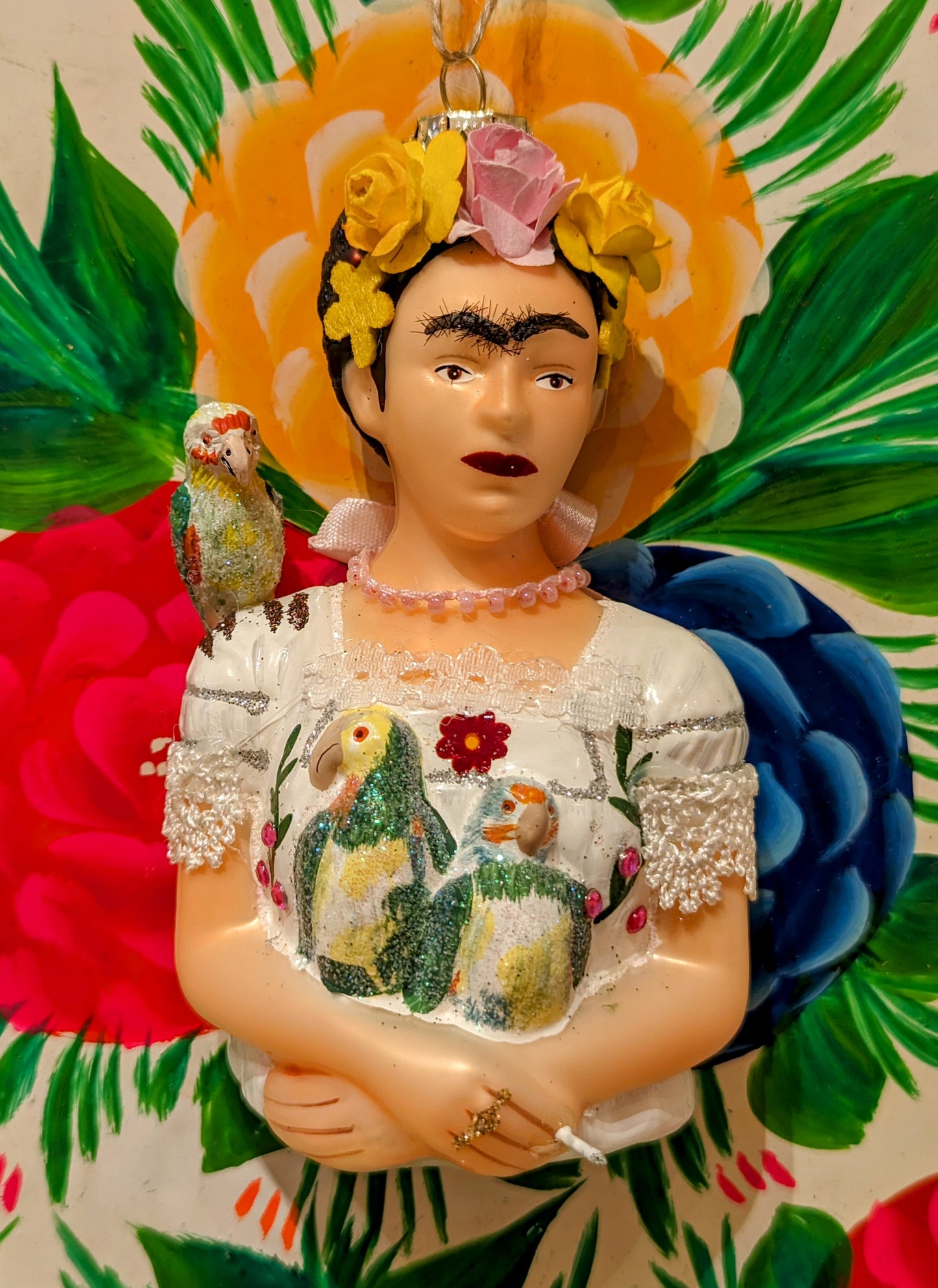 Frida with parrots