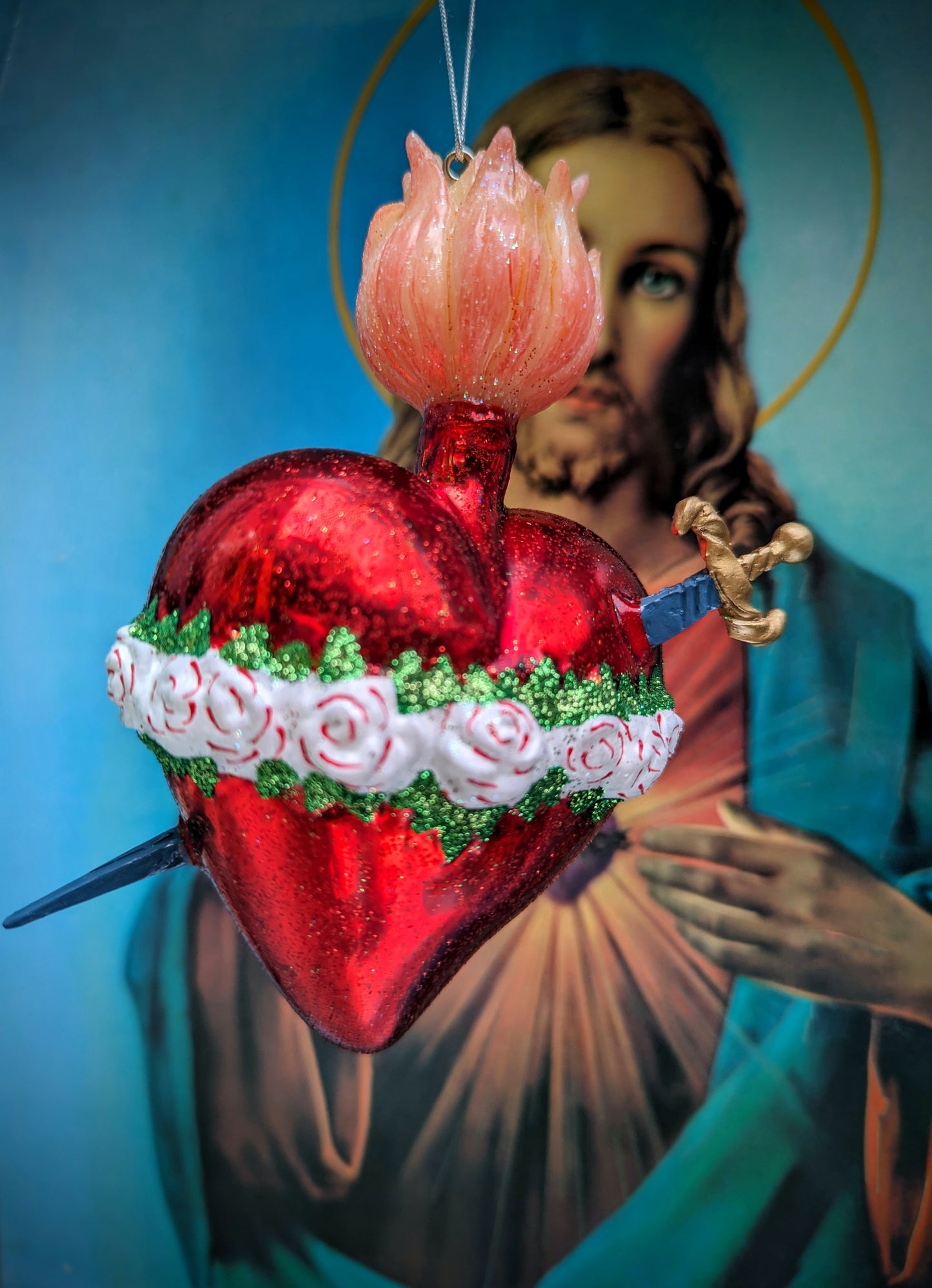 Big and beautiful flaming Sacred heart of the Virgin with roses and a sword!! a gorgeous addition to your Christmas tree or festive holiday display, but also the BEST wedding gift!
Hand finished glass decoration
Size 12 x 5 x 3.5cm
Fragile, handle with care
Cody foster and co sacred heart