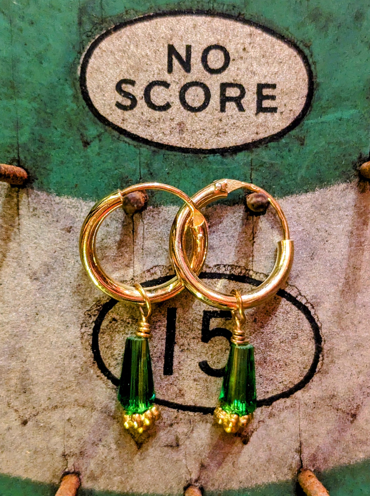 Swaro gold plated hoops