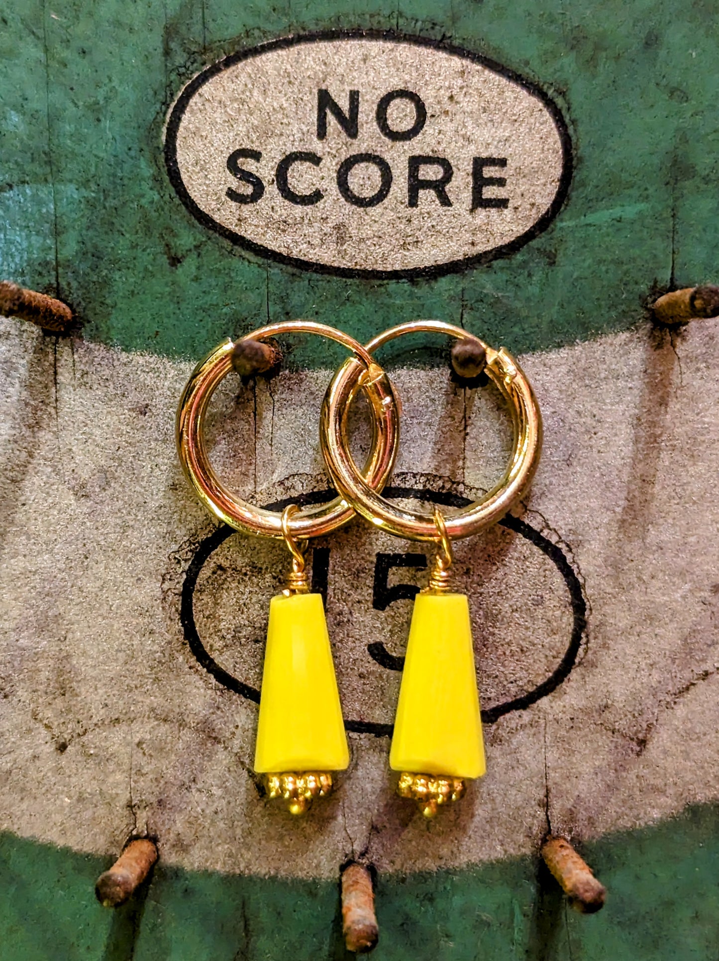 Swaro gold plated hoops
