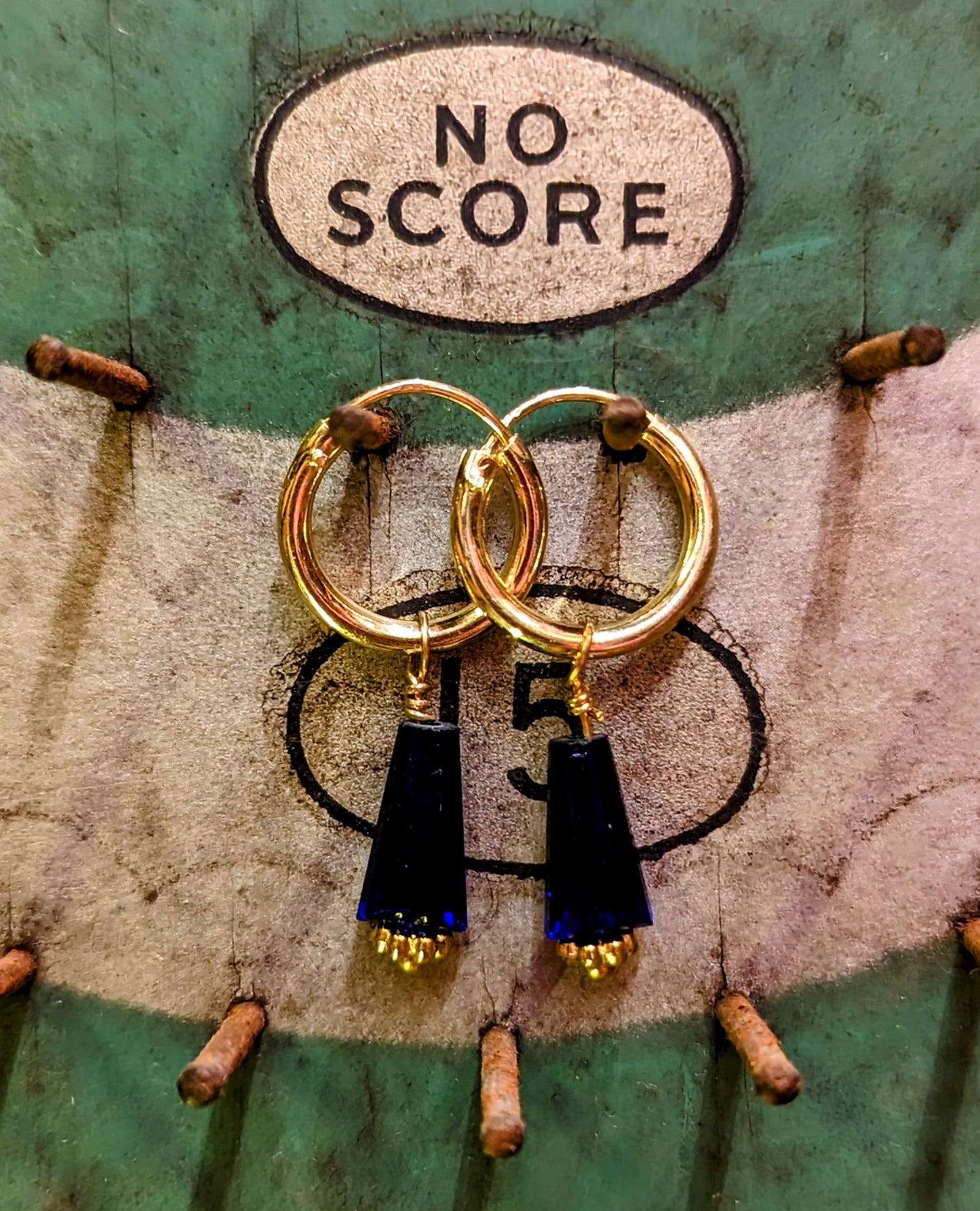 Swaro gold plated hoops