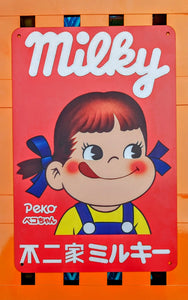 Milky sweets tin signs