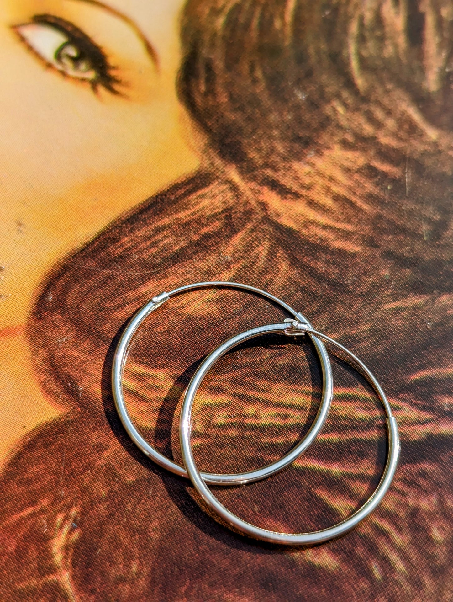 Simple silver hoops