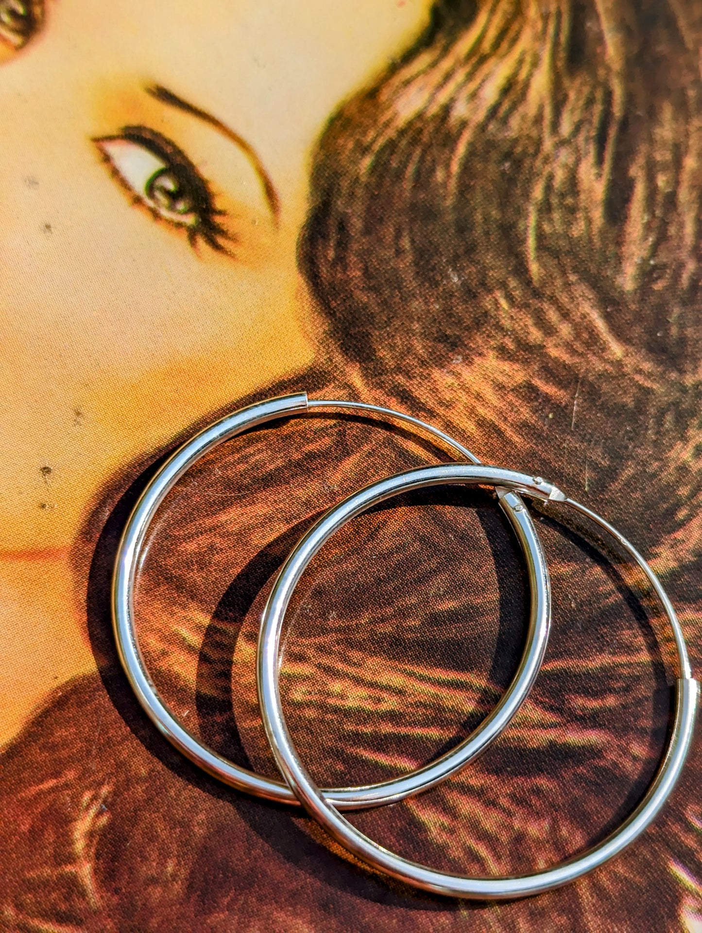 Simple silver hoops