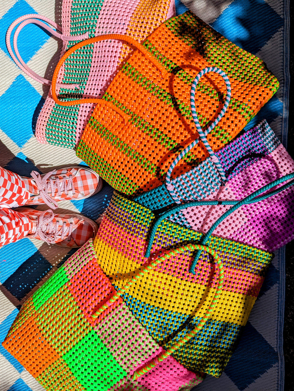 Colourful and super strong these gorgeous baskets are handmade just for us  in a fishing village in  Tamil Nadu!

We love a bit of scoubidou and these are made so beautifully by the women we work with, each takes 3 days to make in between looking after the house,family and fish! All are unique and every maker has their own style!

Sizes vary slightly due to their handmade nature. Handles are ong enough to wear over the shoulder.

Approx

30cm tall

45cm length

14cm wide

Excluding handles.