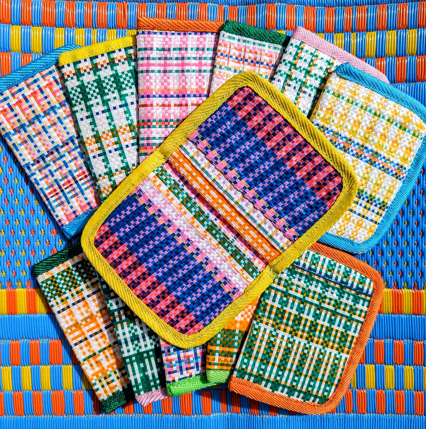 Everyday colour with these cute card wallets .
Perfectly practical , and made with fantastically bright coloured edging
Made with recycled packaging sacking in the best checks!!
13cm x 10cm