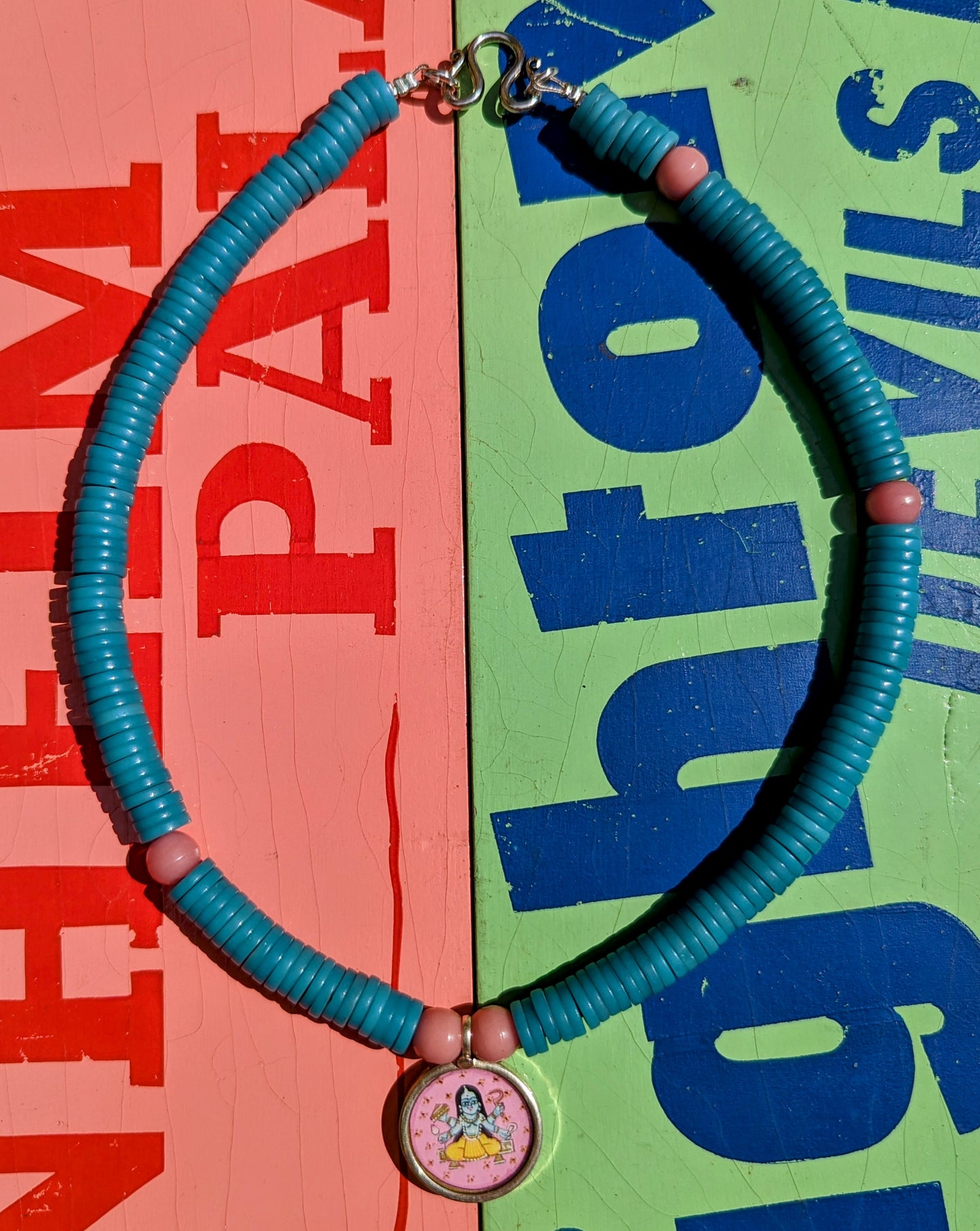 Pastel trade beads with hand painted silver pendants