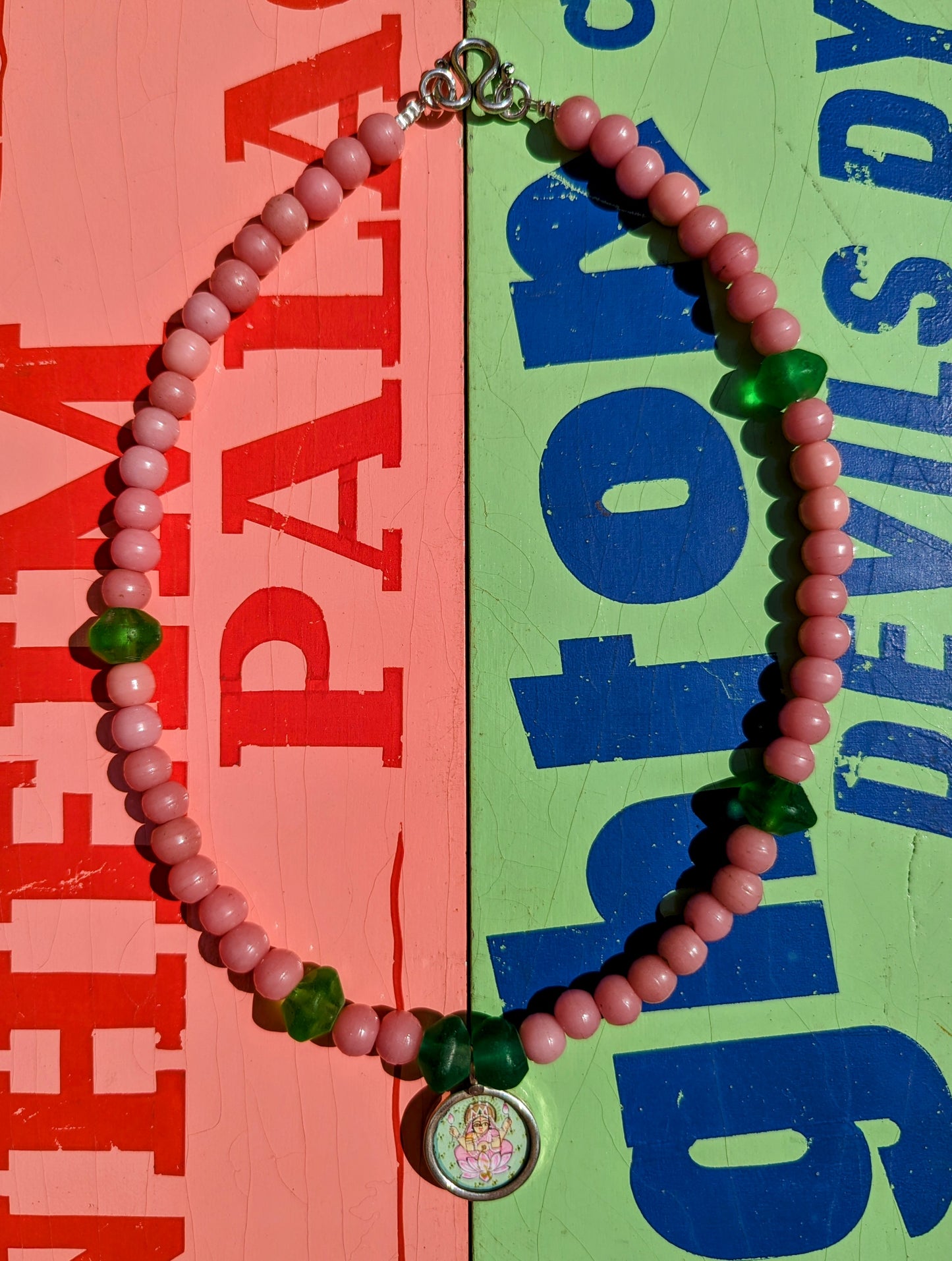 Pastel trade beads with hand painted silver pendants