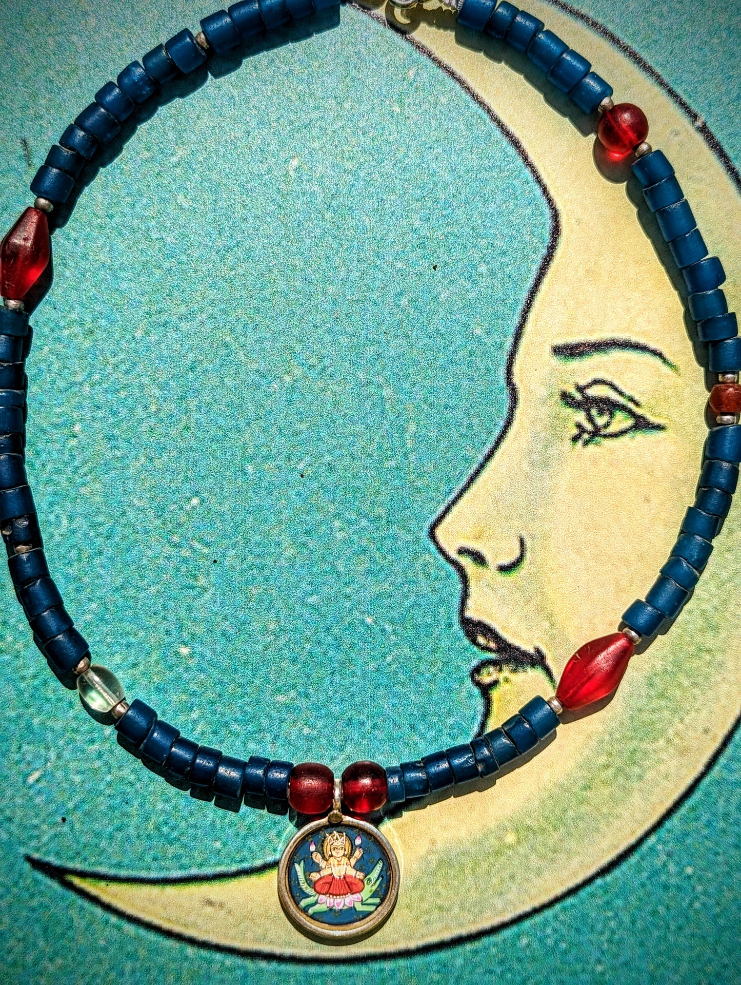 Celestial trade beads with hand painted silver pendants