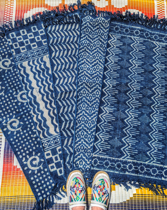 Handwoven cotton rugs resist dyed with natural indigo. These fade beautifully with time and wear like denim. The back of the rug is plain indigo.
Dimensions 2ft x 3ft (60 x 95 cm)
Unbleached cotton, natural indigo 
Washable at 30 degrees,dry naturally. 
Indigo dye way rub off onto skin and surfaces,it will wash out as it is notoriously difficult to fix, but we would advise not to put it onto a cream carpet!
The indigo will give out less as it is washed and used.