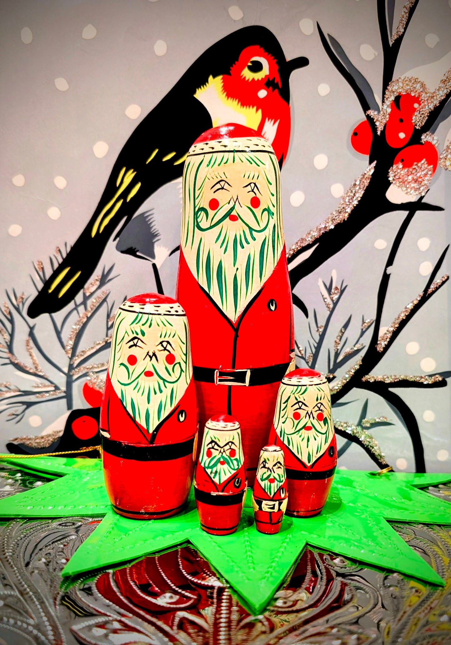 Hand- made, hand carved and beautifully painted folk art nesting Santa matryoshka dolls!
The magic of opening them all up and putting them all in again...all hand turned and painted in Northern India by toymakers.
Outer doll is 16cm x 5cm x 5cm.
Painted wood.