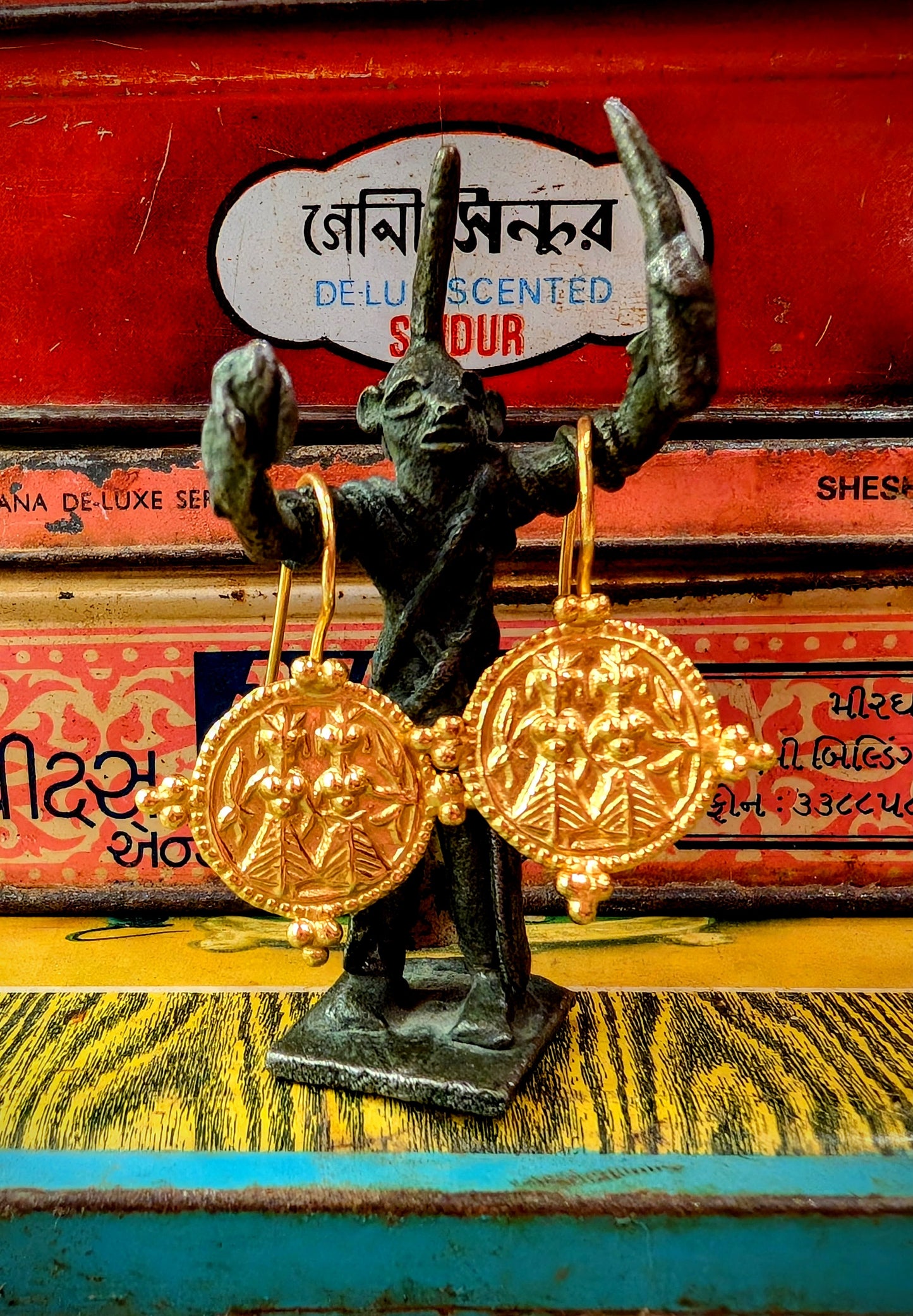 Golden amulet earrings