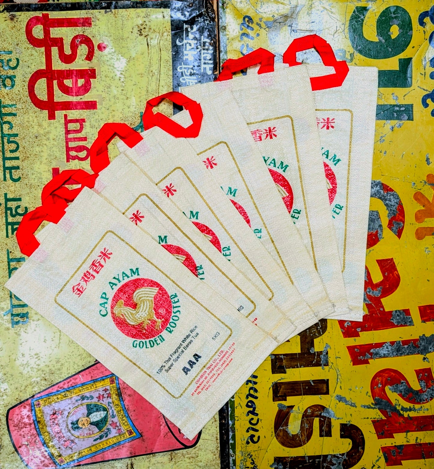 Recycled rice bags with fabulous golden rooster brand design, fabulous for gift bags or for a bit of shopping!!....also looks great along with our punchy packaging clothing!.
Made with recycled woven plastic.
Approx 44 cm x 23cm x 7cm plus handles.