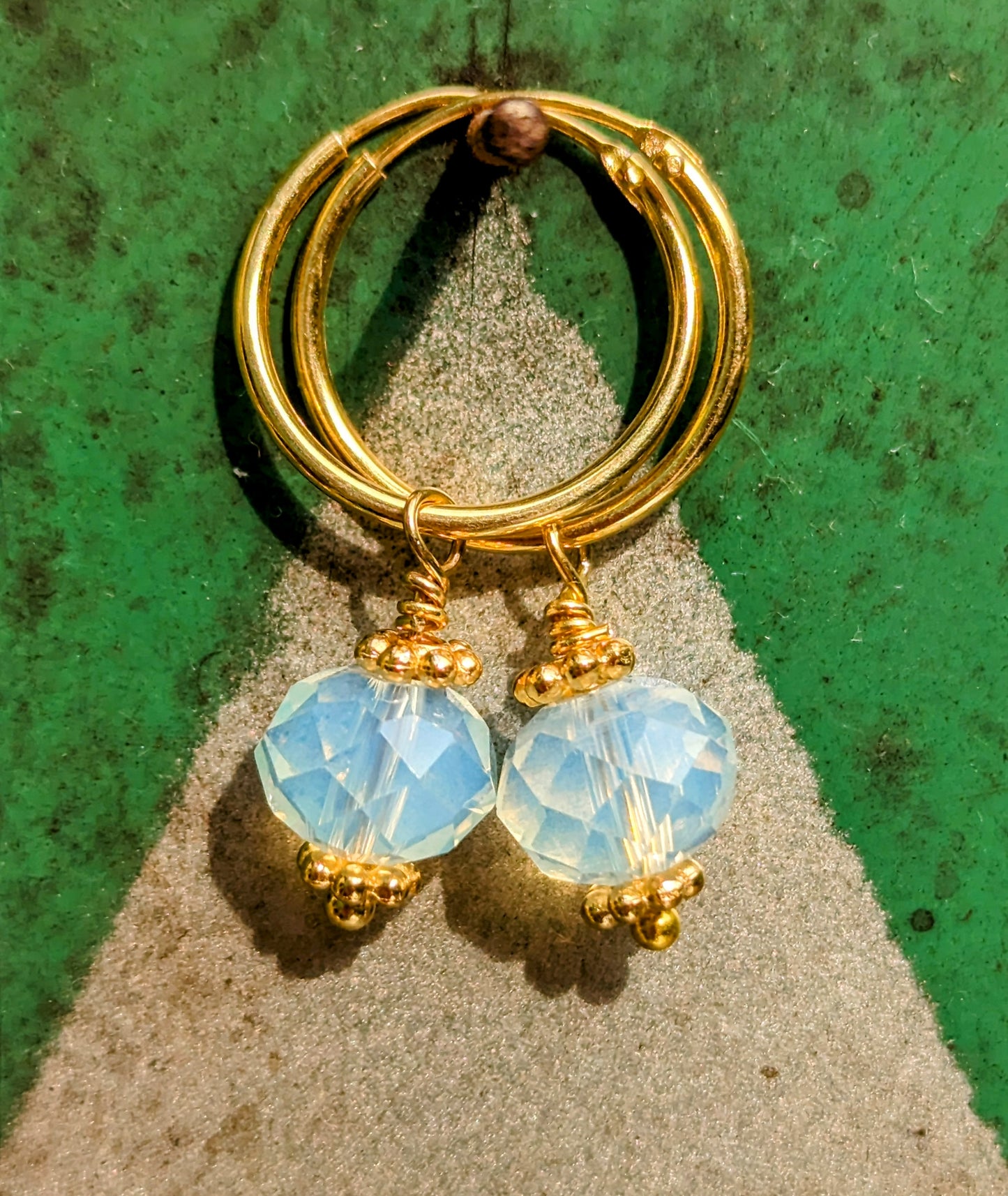 Swaro gold plated hoops - round