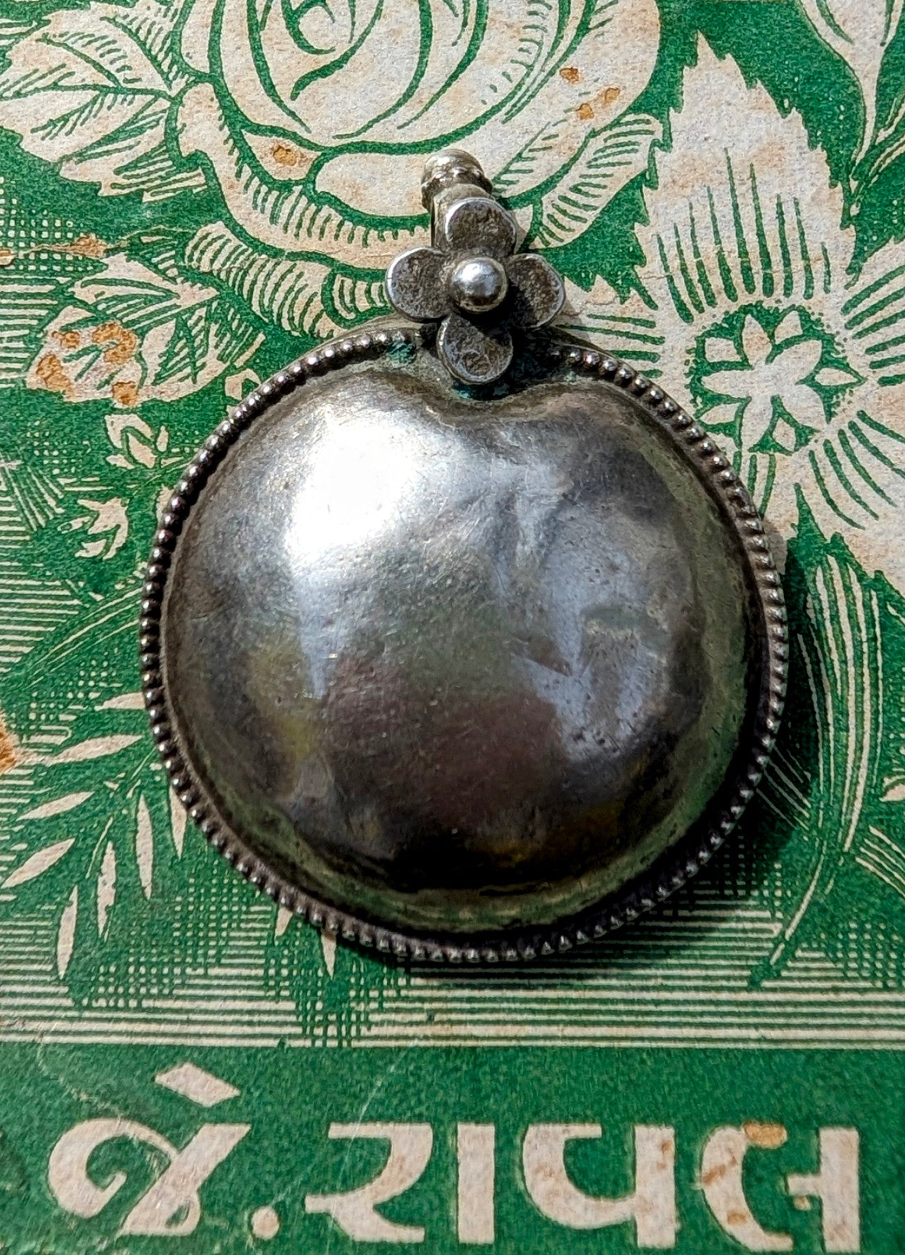 Antique silver floral pendants