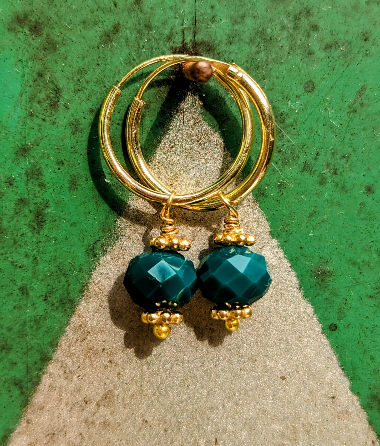Swaro gold plated hoops - round