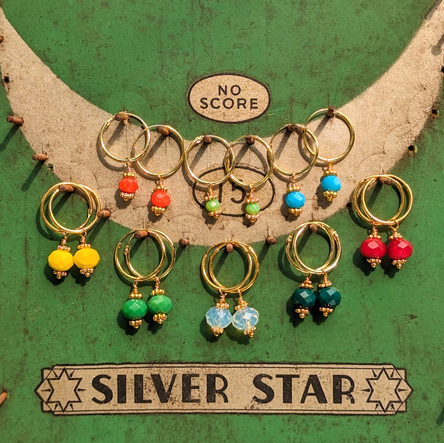 Swaro gold plated hoops - round