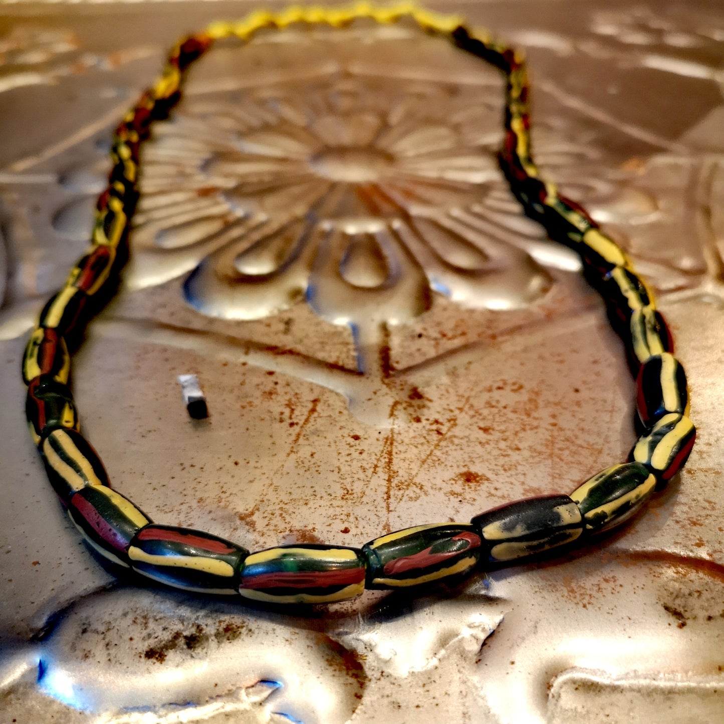 Green and yellow collection of antique and vintage trade beads
