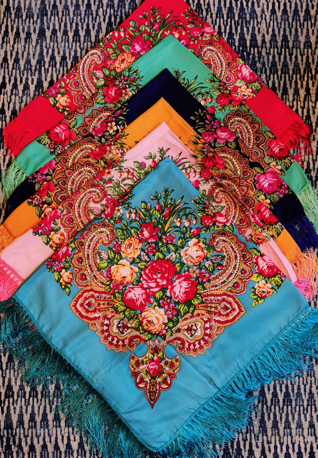 Traditional Russian shawls, fabulous floral folk beauties in a rainbow of colours these look just as beautiful as a tablecloth or a shawl!

105cm Square.

Rayon

