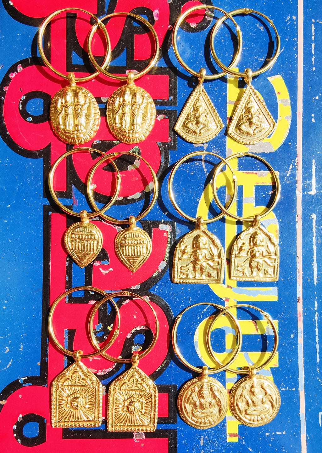 Rajasthani Hindu gods amulet hoop  earrings,handmade in rich,buttery goldest,gold plated silver

 Plated earrings must be treated with care, to keep the plate rich for as long as possible remove when washing, applying creams, perfumes,using detregents etc. 

 

