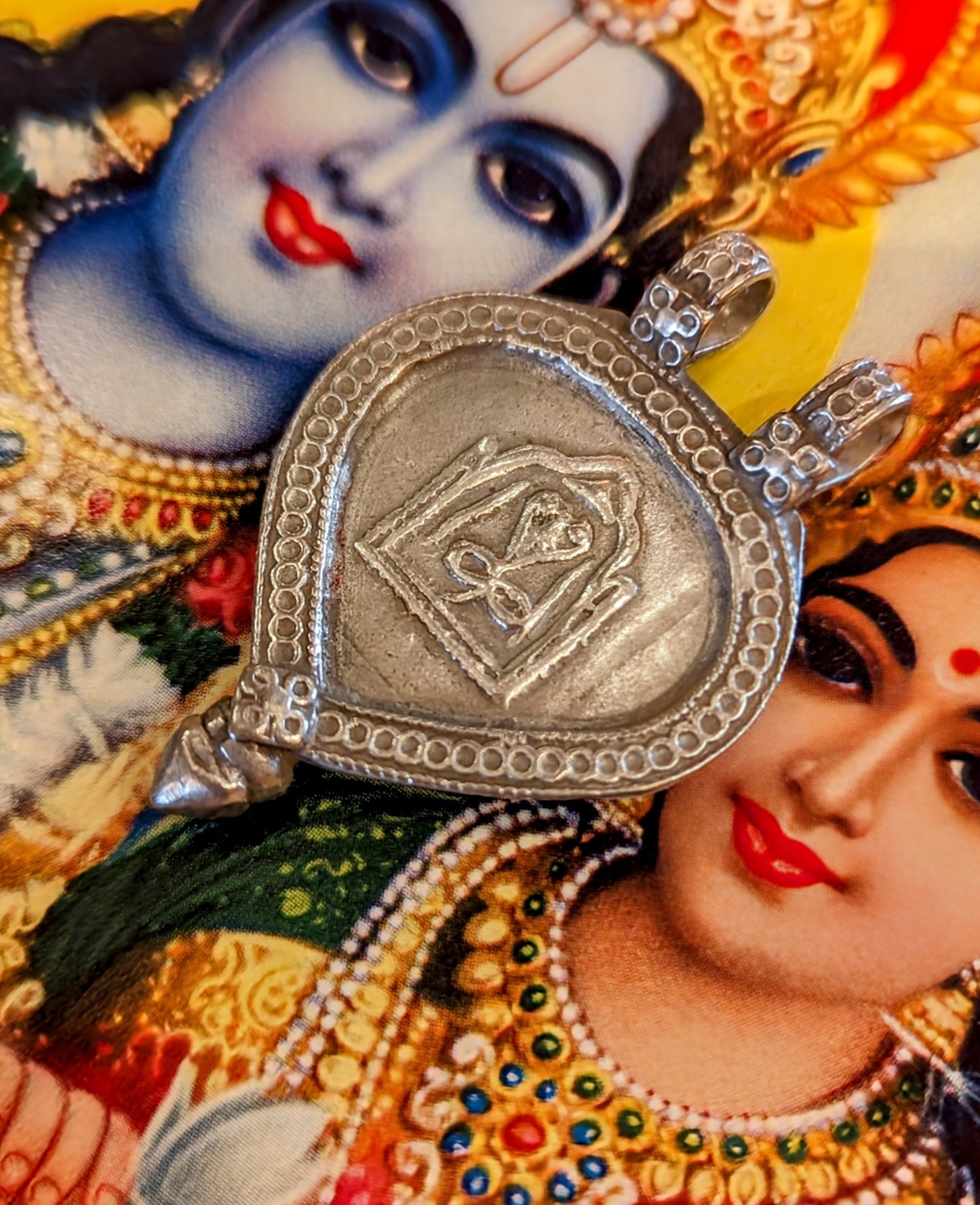 Antique silver serpent pendants