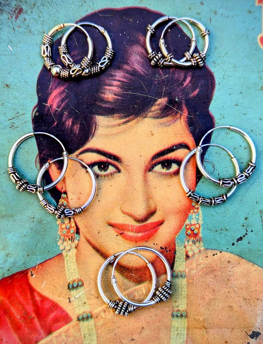 Traditionally made in the north of India. 
The wirework is all twisted by hand into place, what skilled makers they are!!
925 silver

Tribal hoop earrings 

