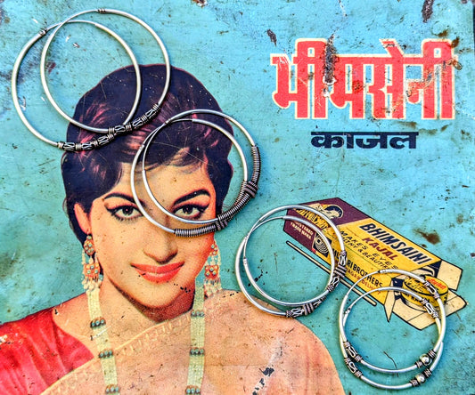 Big and beautiful everyday wear hoops, traditionally made in the north of India. 
The wirework is all twisted by hand into place, what skilled makers they are!!
925 silver

