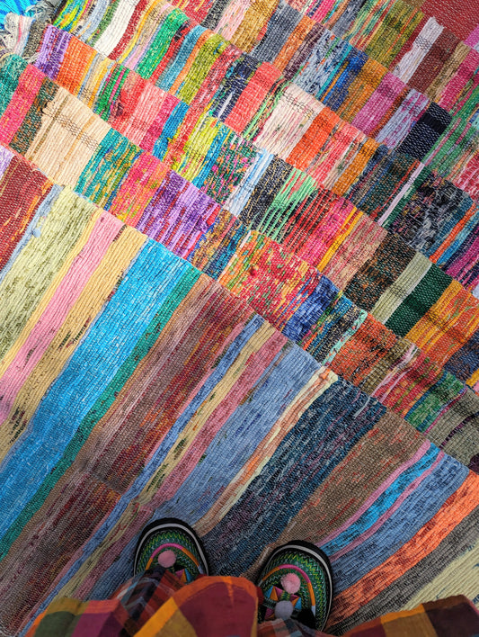 Made from surplus fabrics produced from the garment industry, these chindis are a fabulous splash of colour to a multitude of spaces and purposes! Great on the floor or as a throw and handily machine washable!

Due to there reuse and recycle, so we advise either salt fixing in the washing machine befo

Materials commonly recycled into these rugs are cotton natural