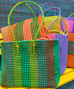 Colourful and super strong these gorgeous baskets are handmade just for us  in a fishing village in  Tamil Nadu!

We love a bit of scoubidou and these are made so beautifully by the women we work with, each takes 3 days to make in between looking after the house,family and fish!

Sizes vary slightly due to their handmade nature. Handles are ong enough to wear over the shoulder.

Approx

30cm tall

45cm length

14cm wide

Excluding handles.

