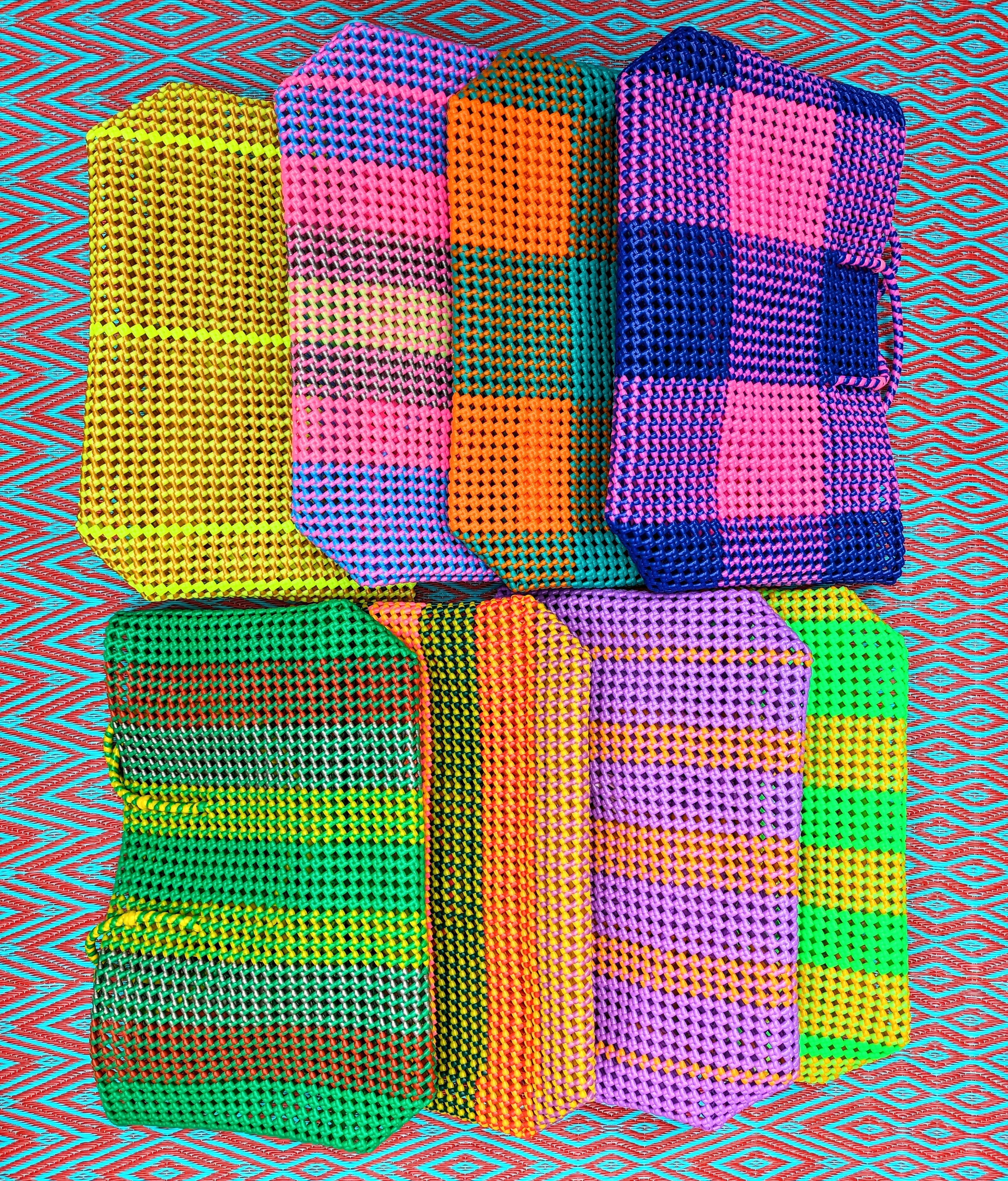 Colourful and super strong these gorgeous baskets are handmade just for us  in a fishing village in  Tamil Nadu!

We love a bit of scoubidou and these are made so beautifully by the women we work with, each takes 3 days to make in between looking after the house,family and fish!

Sizes vary slightly due to their handmade nature. Handles are ong enough to wear over the shoulder.

Approx

30cm tall

45cm length

14cm wide

Excluding handles.

