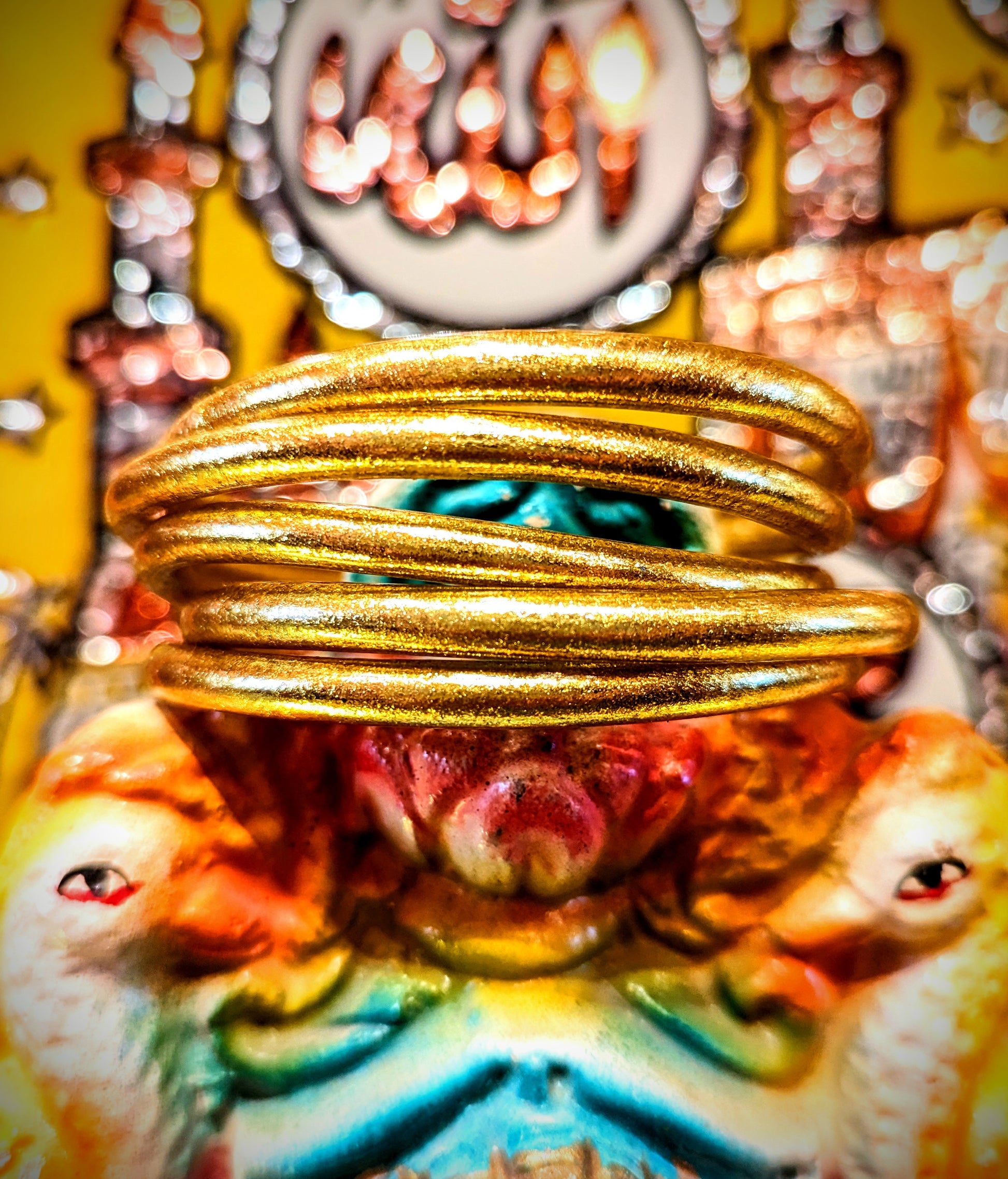 Wonderful every day wear, waterproof, weightless bangles.

Crafted in Thailand , these are made from tubing lined by hand with real gold leaf, the same as is used on Buddha statues.  Wear them swimming, working, playing and  you never lose the glam, gold shine!

Made of medical grade tubing and gold leaf..

Medium inside diameter 6cm

Large inside diameter 6.5cm

buddha bangle. gold bangle