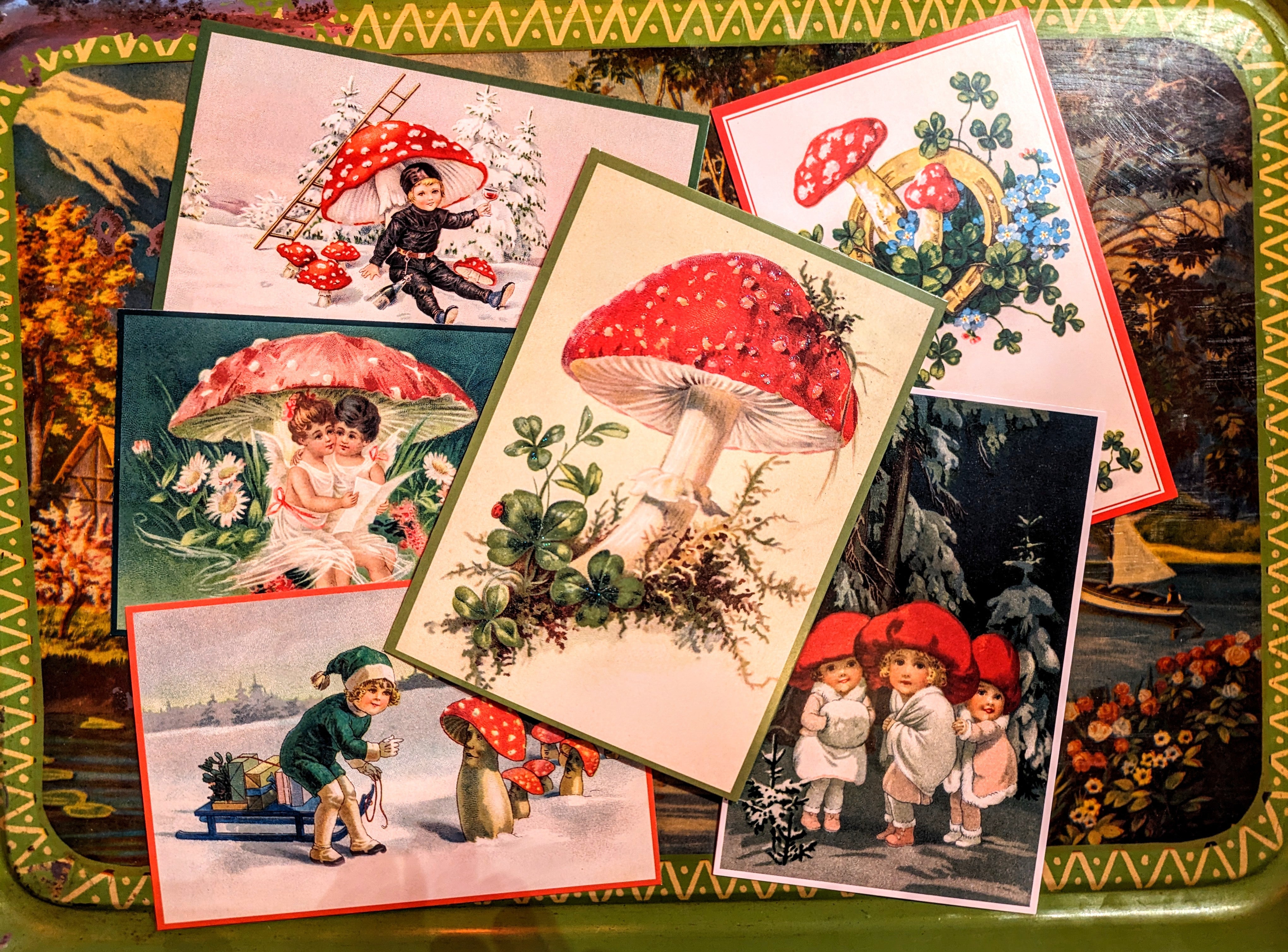 Set of 6 beautiful postcards with images taken from vintage (1910-1930) winter German illustrations of woodland folklore, toadstools and cute kids!....all our favourites!! 

Postcards come with  coloured envelopes.

 

