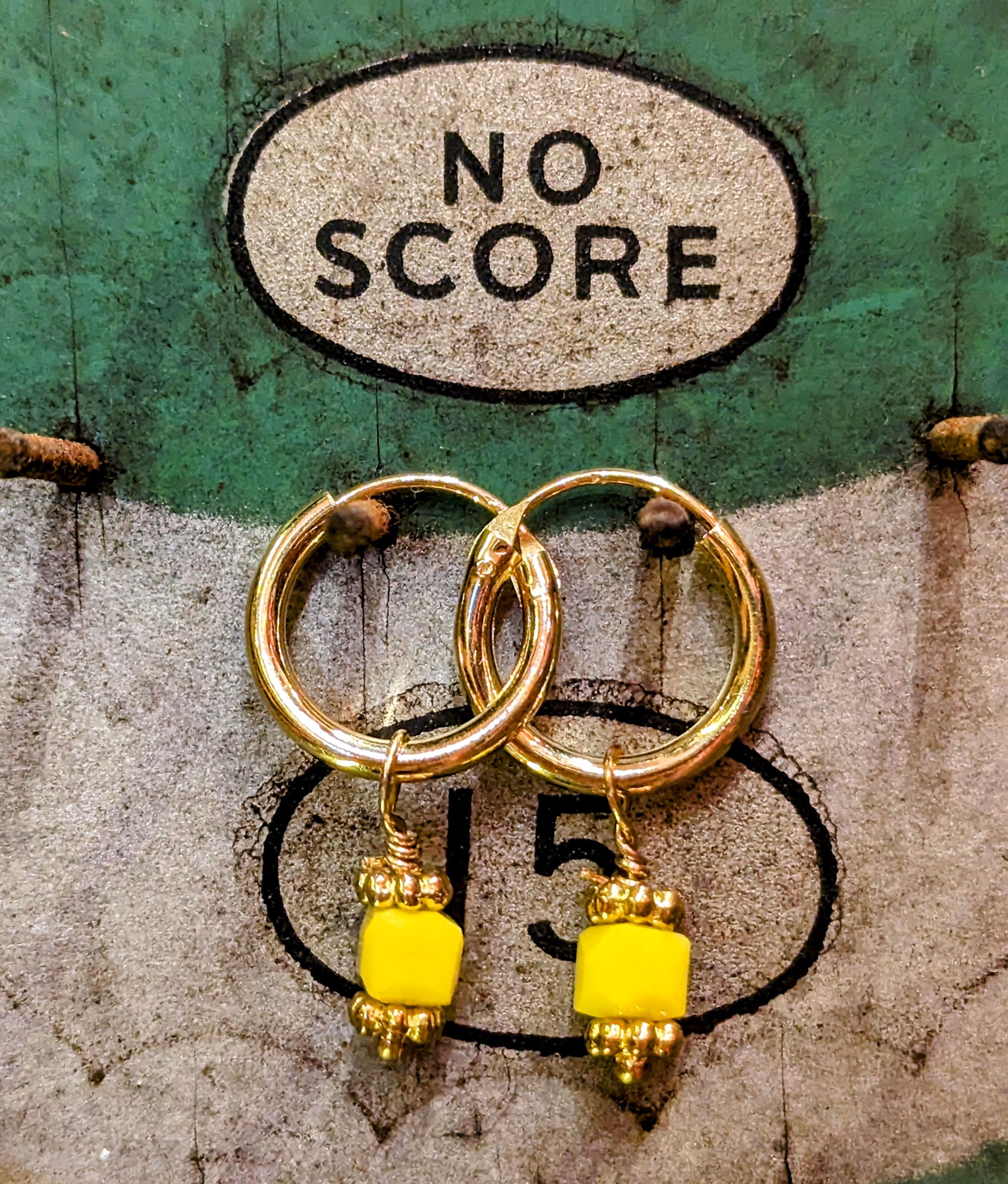 Swaro gold plated hoops