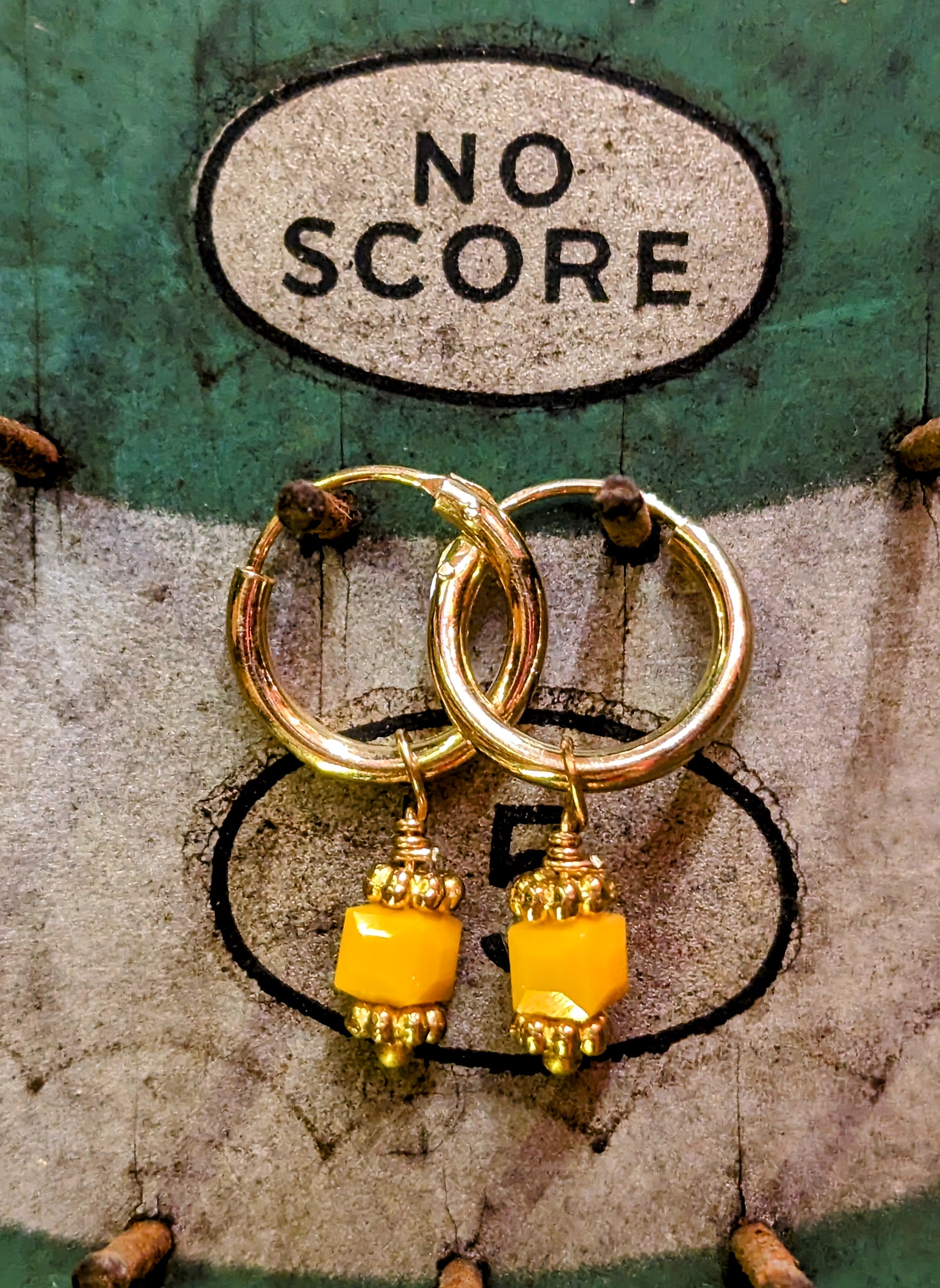 Swaro gold plated hoops