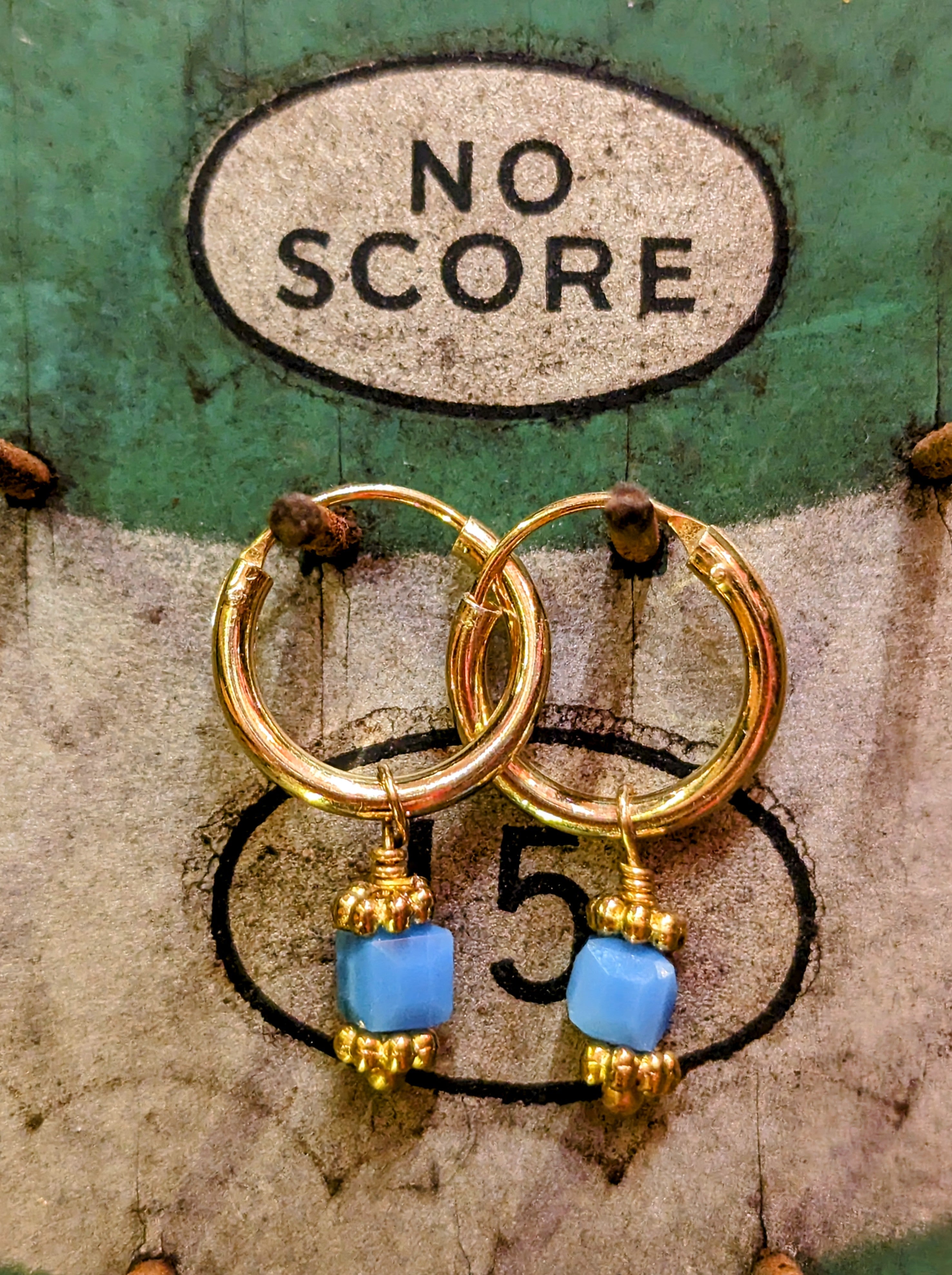 Swaro gold plated hoops