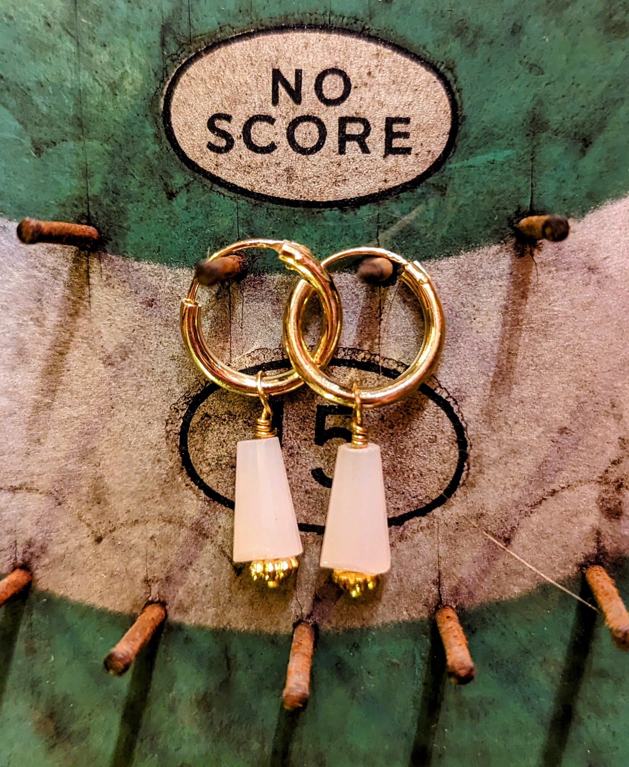 Swaro gold plated hoops