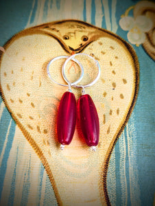 Antique red trade bead hoops