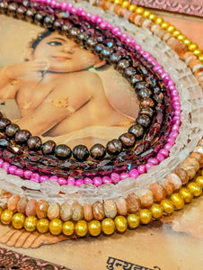 Gorgeous warm coloured precious and semi-precious stone bead necklaces hand cut in India.

Sunstones, garnets, rose quartz, freshwater pearls.... all our favourite fresh and earthy warm tones

Necklaces threaded on tiger tail, by us here at Blackout and finished with silver S hook findings and a silver Hill Tribe charm.