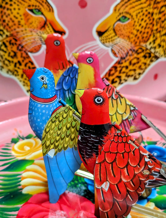 Singing tin birds
