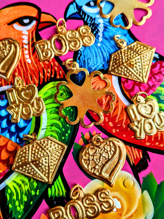 Super rustic Indian kitsch loving charms or pendants. Wear them, craft or decorate and accessorise!! A fab postal or party bag gift too!

Comes as a set of 5

Made of brass.

Approx 2.5cm x 3cm each