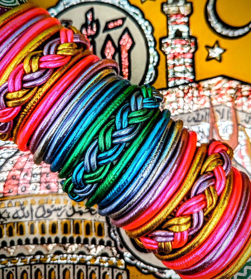 Wow, just look at the colours!!!Wonderful every day wear, waterproof, weightless bangles.

Crafted in Thailand , these are made from tubing lined by hand with real coloured gold leaf, the same as is used on Buddha statues.  Wear them swimming, working, playing and  you never lose the glam, disco dolly shine!

Made of medical grade tubing and coloured gold leaf..

Size nside diameter 6.5cm

 
