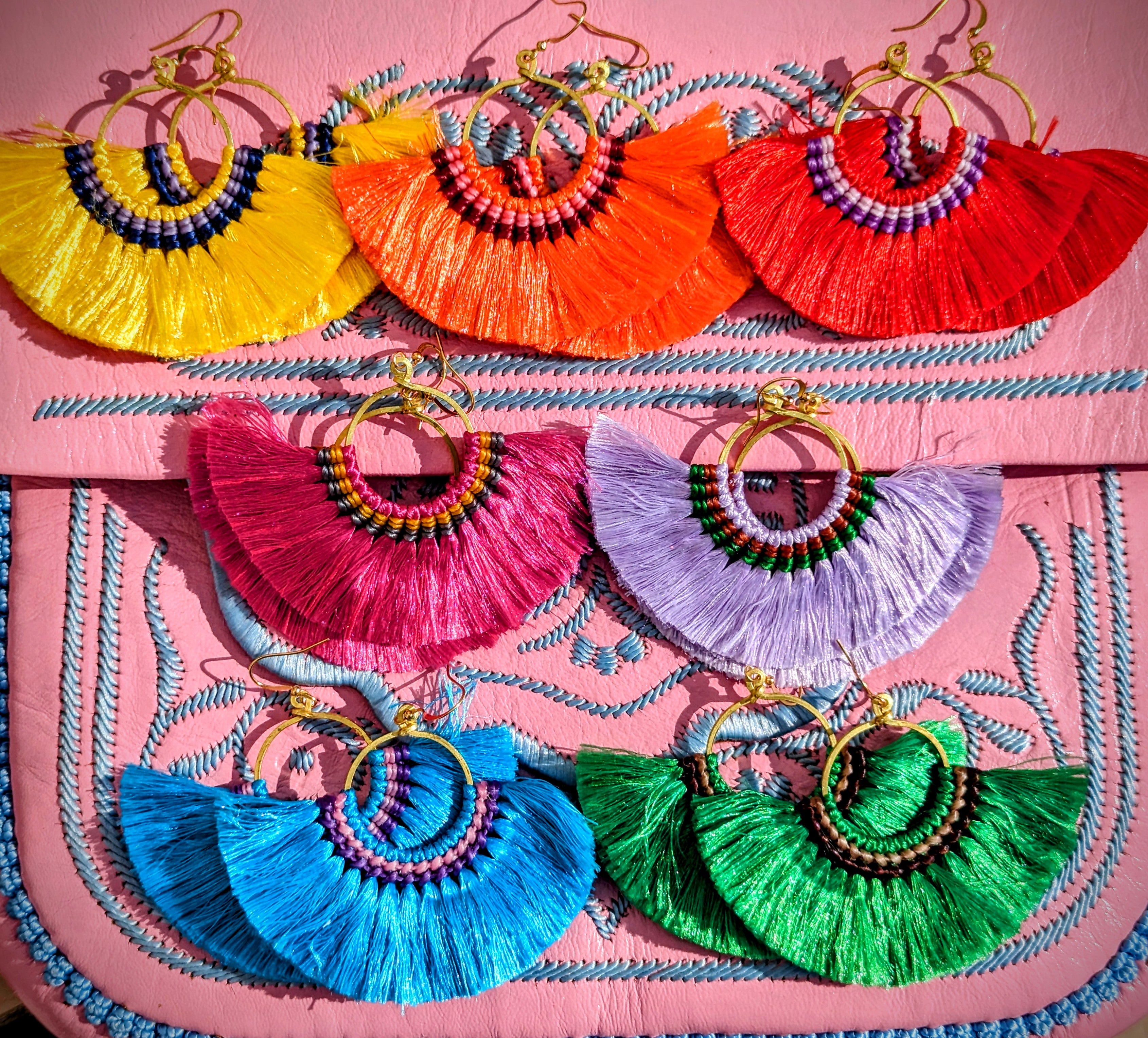 Hand knotted on to brass, these stunning, light,  silk fan earrings pack quite the punch, in a rainbow of delightful colours, perfect for a colour pop for parties and festivals galore!!



Half fan size 8 cm width 7 cm drop.

