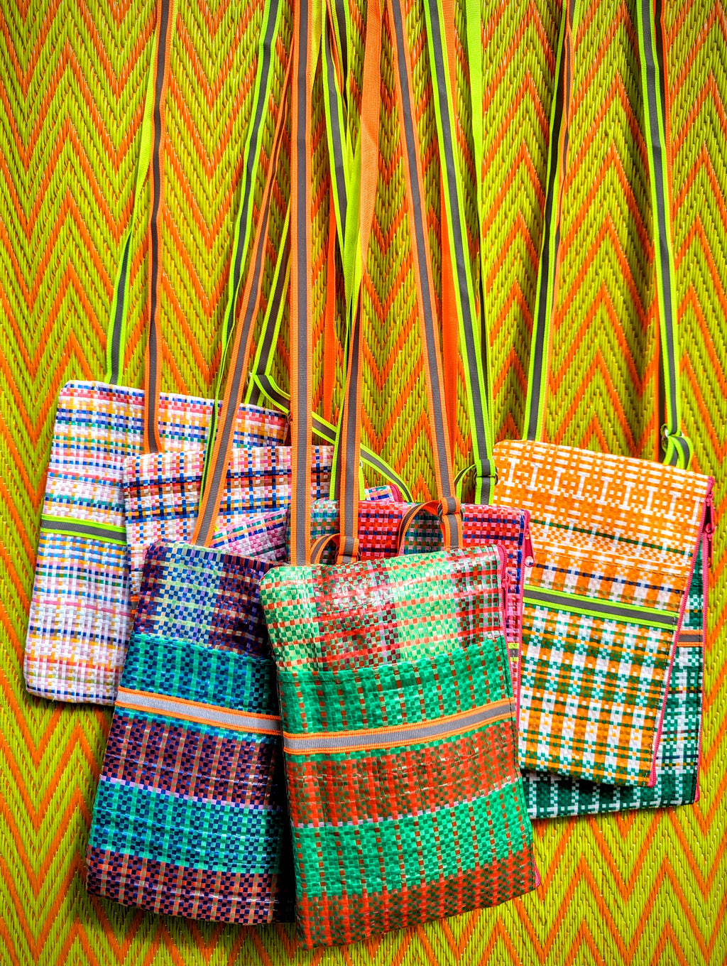 How great are these?!?!

Travelling far or near, these cute passport or phone bags will hold everything you need for a night out or a trip around town!

Perfectly practical , and made with fantastically bright coloured trim and strap!

Made with recycled packaging sacking in the best checks!!

20cm x 14cm

 