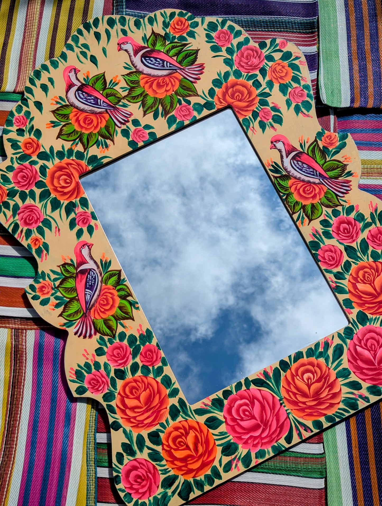 Big, beautiful birds and roses mirror