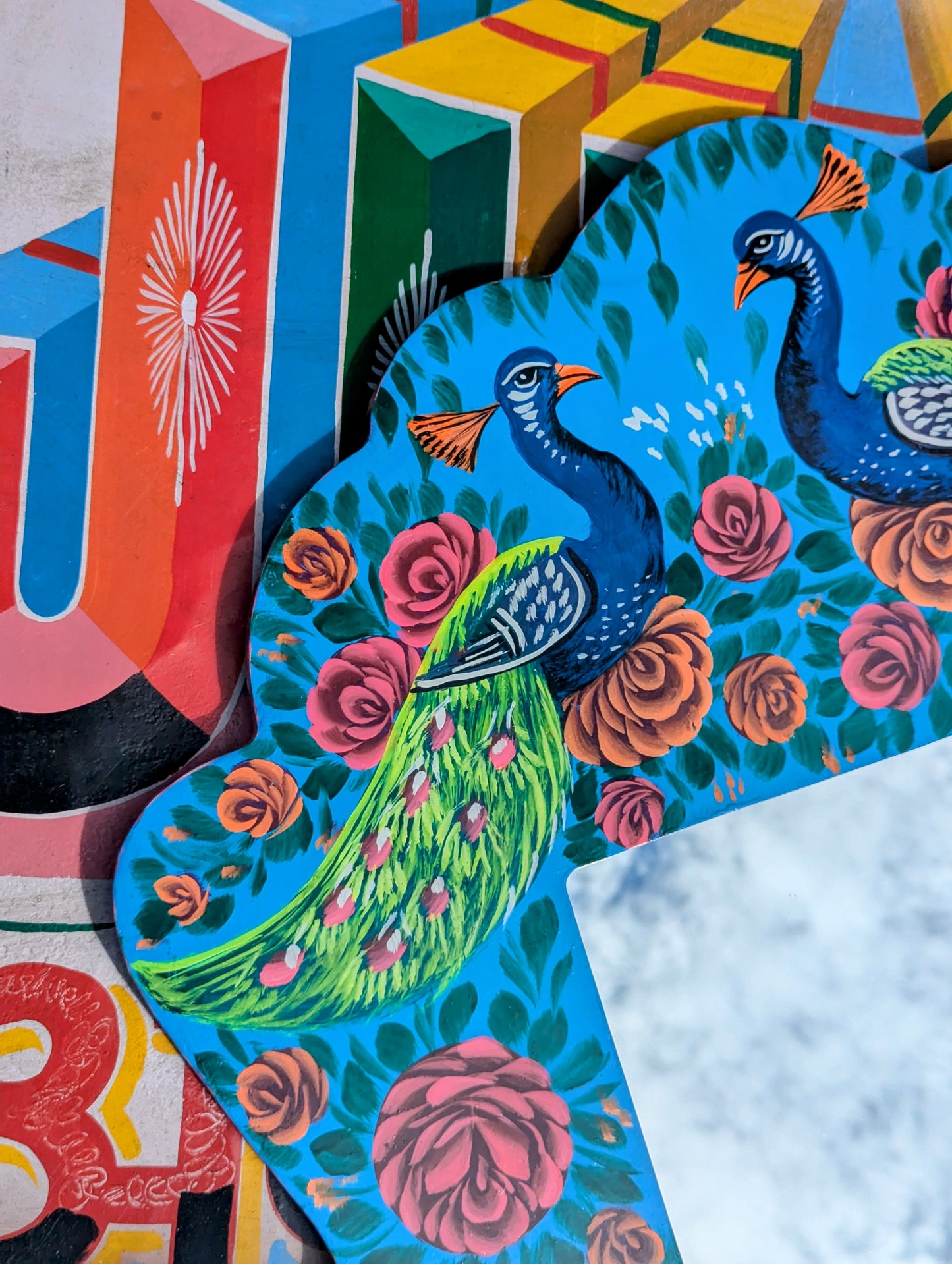 Big, beautiful birds and roses mirror