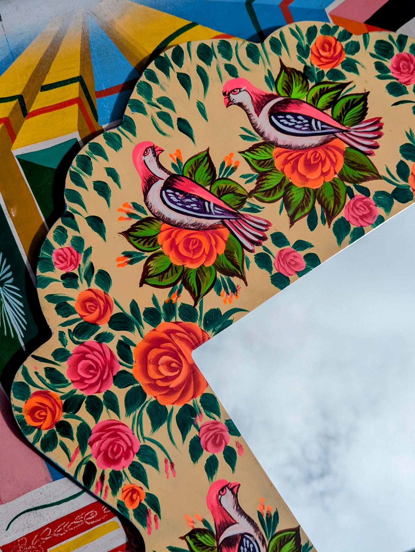 Big, beautiful birds and roses mirror