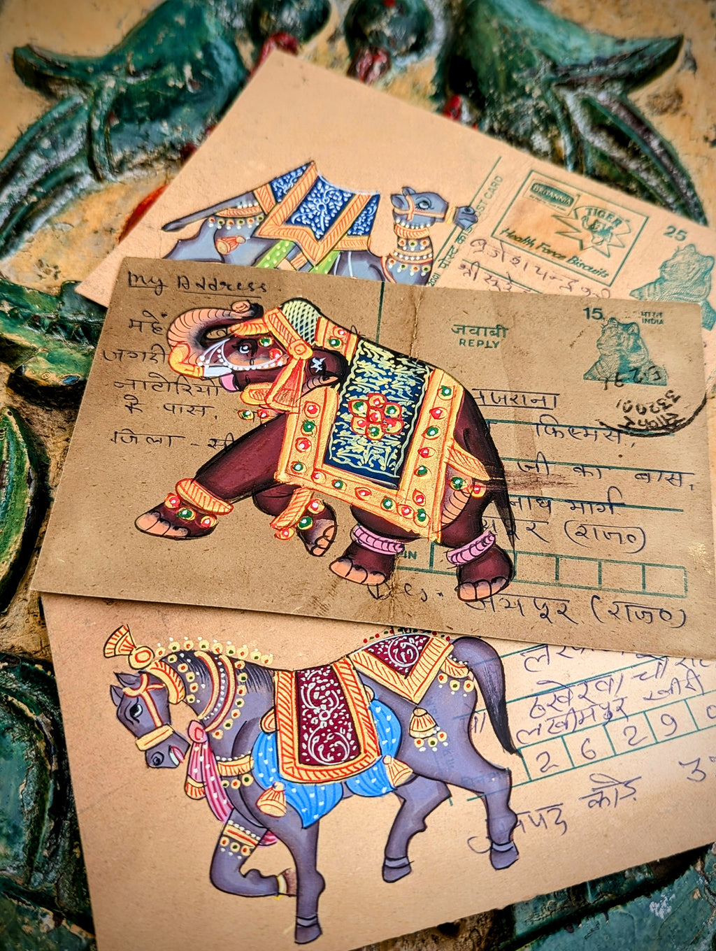 This form of painting in India is typically undertaken by the apprentices learning to paint miniatures. They often used recycled documents, letters and in this case postcards. All are original pieces.

 Rajasthani painting
Indian miniature painting 
Elephant painting 
Camel painting
Rajasthani horse