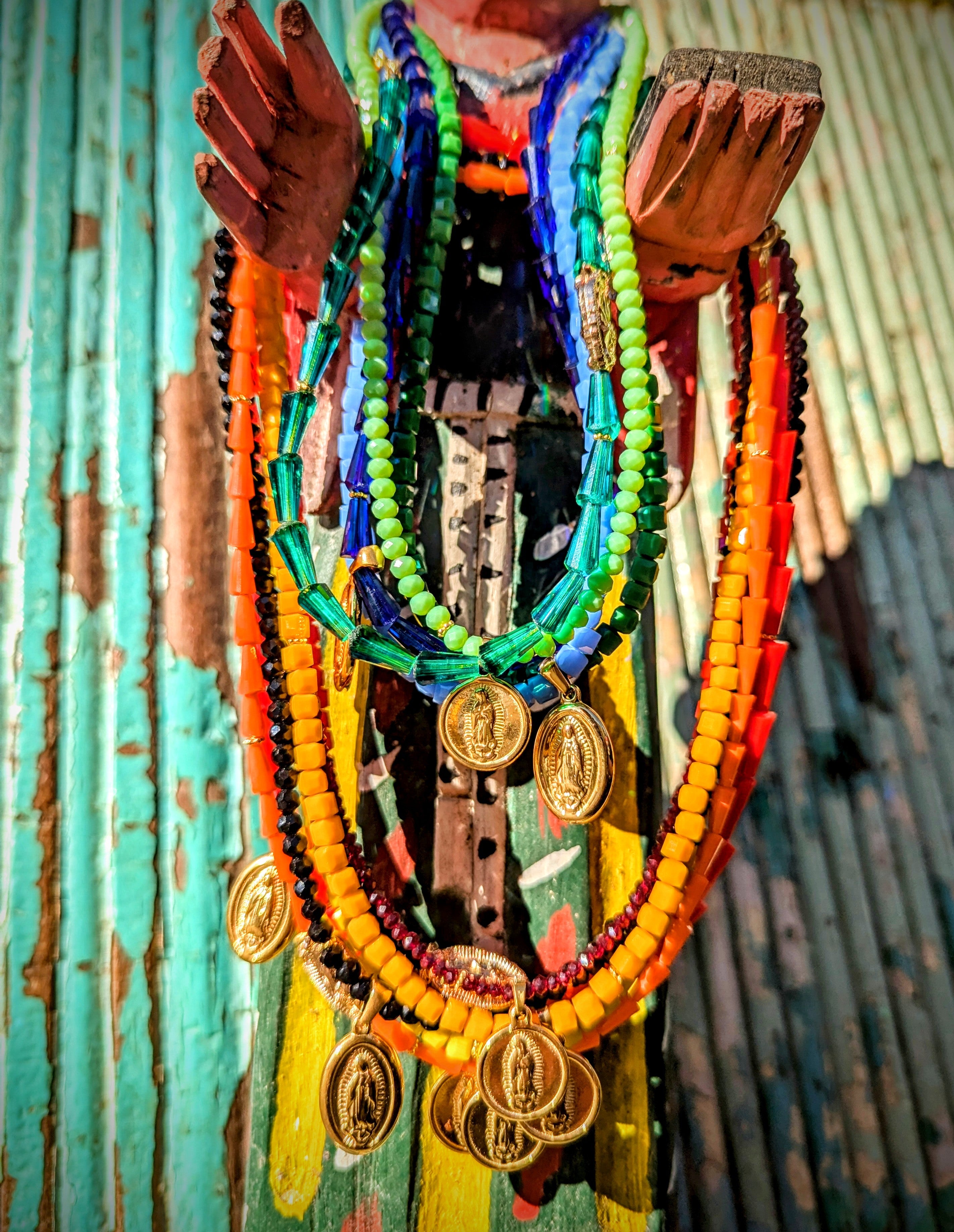 Mexican Virgin quality kitsch!!!  A selection of Blackout made, hand faceted crystal necklaces with gorgeous gold Guadalupe pendants, all slightly different lengths, pendants and beads, so look great mixed up together too!!

Lengths all around 17 inches.

Glass crystal beads with gold plated pendants, beads and fittings.

 