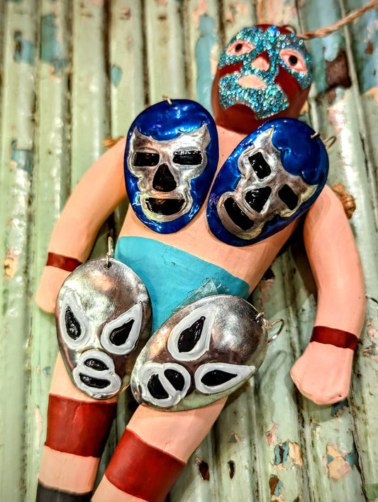 Loving the luchadors!!
Mask up with these handmade tin (poor man's silver!) earrings made in Oaxaca, Mexico.


Tin head
Silver plated nickel hooks
Approx 5cm drop
 