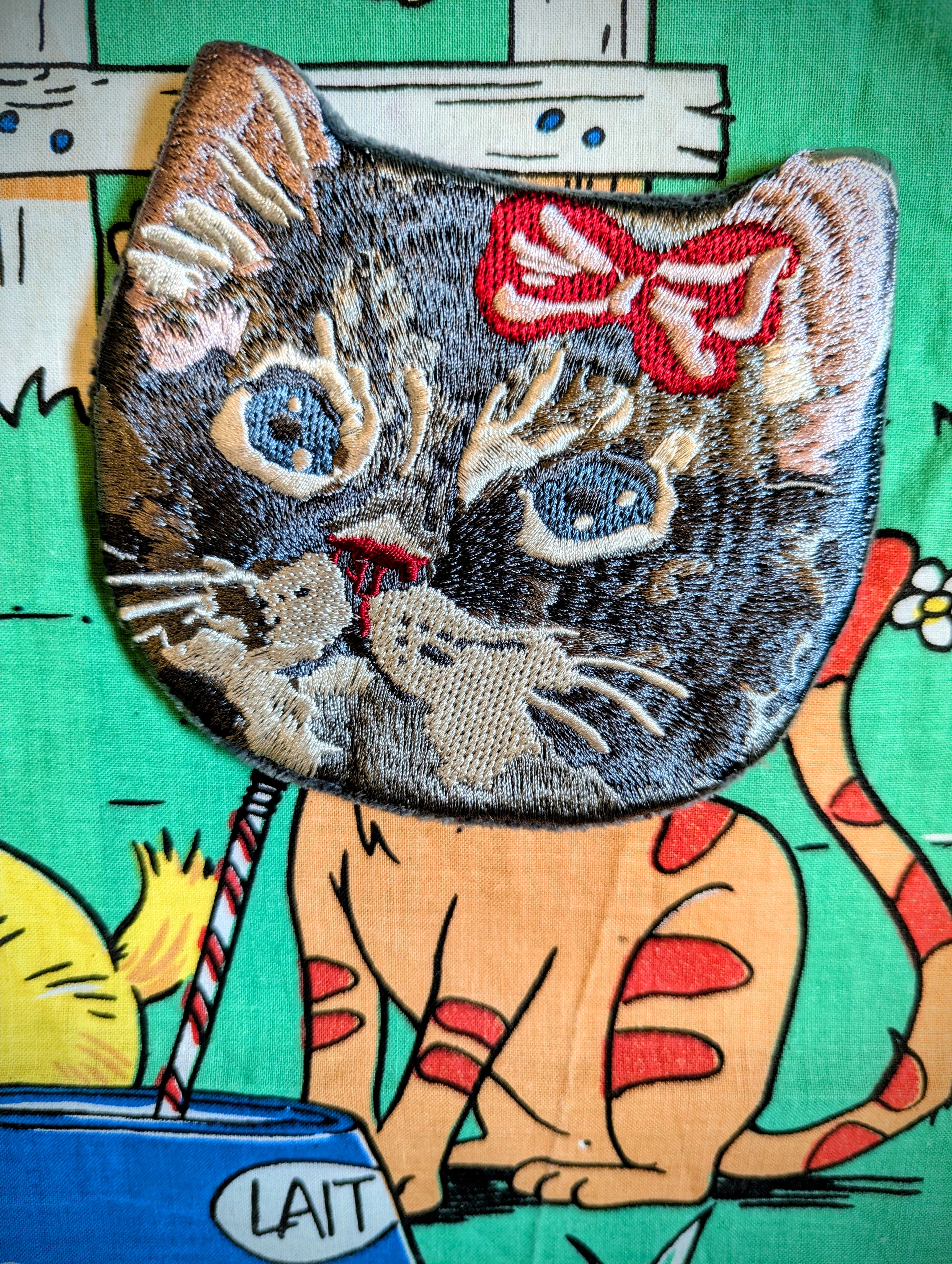 Embroidery puss purse